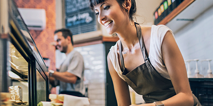 female small business owner in cafe